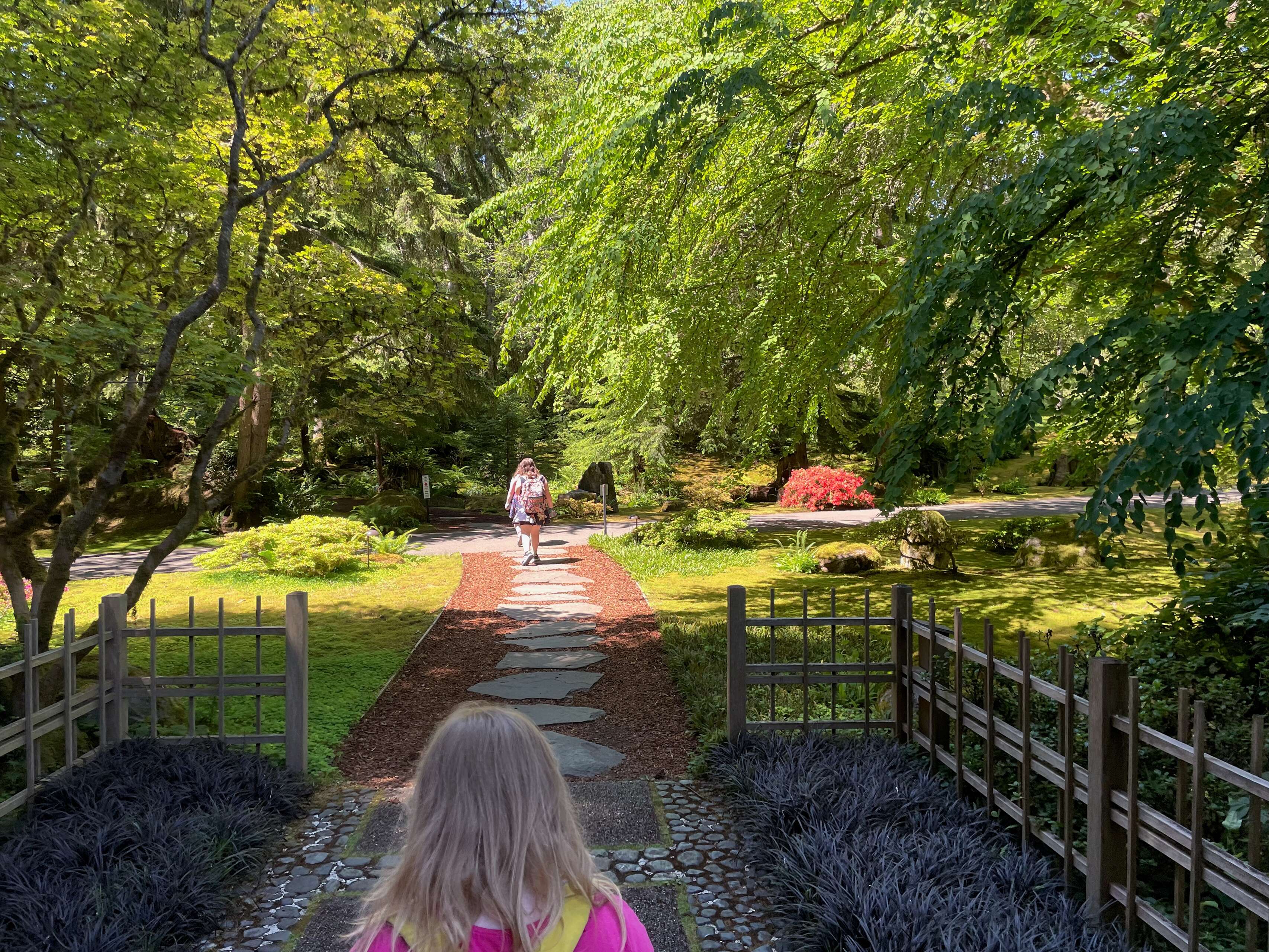 [ Photo of two of my kids walking on a path at Bloedel Reserve on Bainbridge Island, Washington ]